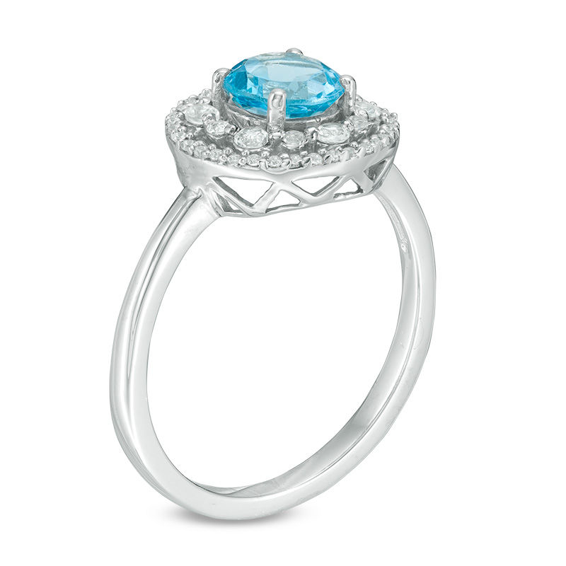 6.0mm Blue Topaz, Lab-Created White Sapphire and 0.09 CT. T.W. Diamond Frame Ring in 10K White Gold