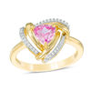 Thumbnail Image 0 of 6.0mm Trillion-Cut Lab-Created Pink Sapphire and 0.09 CT. T.W. Diamond Swirl Frame Ring in 10K Gold