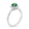 Thumbnail Image 1 of 5.2mm Lab-Created Emerald, White Sapphire and 0.09 CT. T.W. Diamond Flower Frame Engagement Ring in Sterling Silver