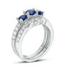 Thumbnail Image 1 of 4.5mm Lab-Created Blue and White Sapphire Three Stone Bridal Set in Sterling Silver