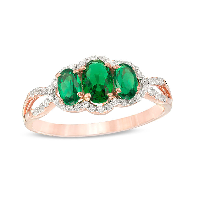 Oval Lab-Created Emerald and 0.15 CT. T.W. Diamond Frame Three Stone Engagement Ring in 10K Rose Gold