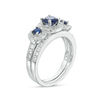 Thumbnail Image 1 of Lab-Created Blue and White Sapphire Frame Three Stone Bridal Set in 10K White Gold