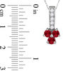 Lab-Created Ruby and 0.12 CT. T.W. Diamond Trio Pendant in Sterling Silver
