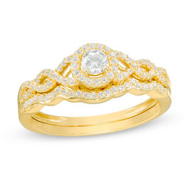0.37 CT. T.W. Diamond Frame Twist Bridal Set in 10K Gold
