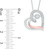 Unstoppable Love™ 0.07 CT. T.W. Diamond Tilted Swirl Heart Pendant in Sterling Silver and 10K Rose Gold