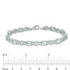 Thumbnail Image 2 of Oval Aquamarine and 0.46 CT. T.W. Diamond "O" Bracelet in Sterling Silver - 7.5"