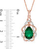 Thumbnail Image 1 of Pear-Shaped Lab-Created Emerald and White Sapphire Free-Form Frame Pendant in 10K Rose Gold