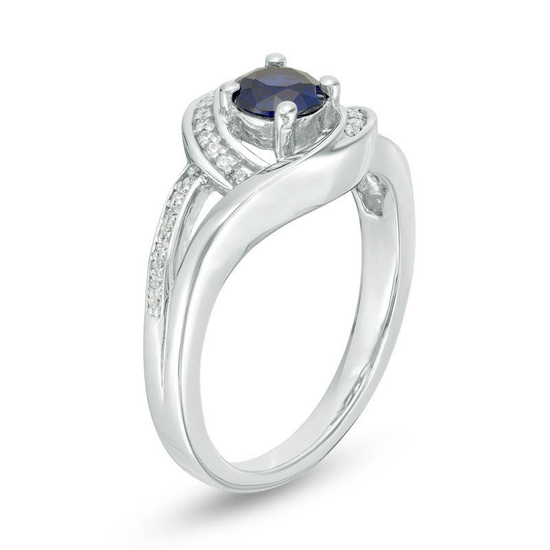 5.0mm Lab-Created Blue Sapphire and 0.09 CT. T.W. Diamond Swirl Frame Split Shank Ring in Sterling Silver