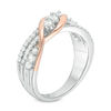 Thumbnail Image 1 of 0.45 CT. T.W. Diamond Three Stone Twist Crossover Ring in 10K Two-Tone Gold