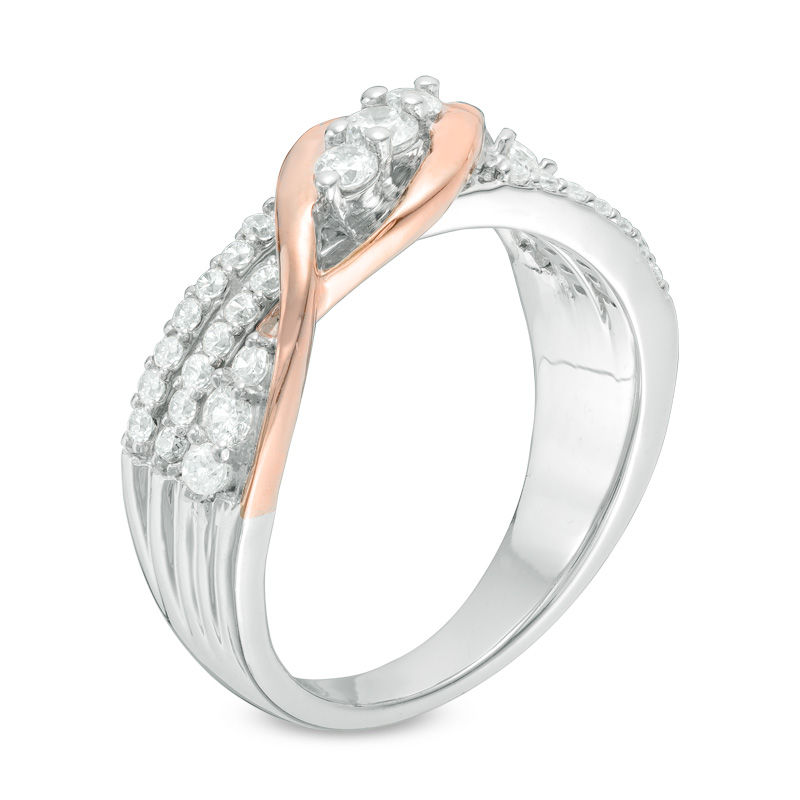 0.45 CT. T.W. Diamond Three Stone Twist Crossover Ring in 10K Two-Tone Gold