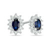 Thumbnail Image 1 of Oval Blue Sapphire and 0.21 CT. T.W. Diamond Starburst Frame Stud Earrings in 10K White Gold