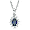 Thumbnail Image 0 of Oval Blue Sapphire and 0.18 CT. T.W. Diamond Starburst Frame Pendant in 10K White Gold