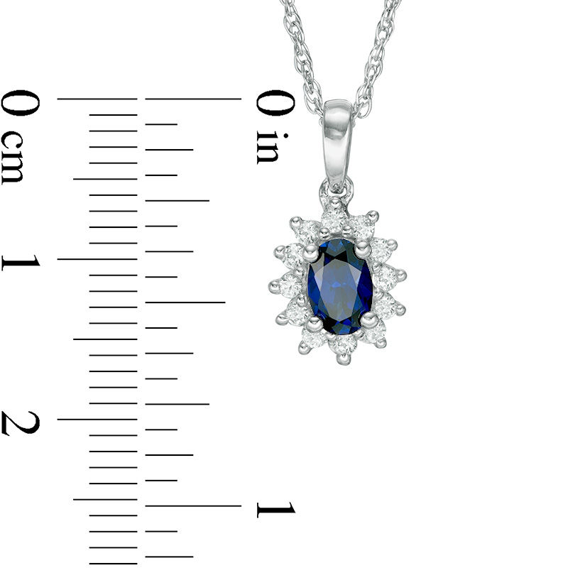 Oval Blue Sapphire and 0.18 CT. T.W. Diamond Starburst Frame Pendant in 10K White Gold|Peoples Jewellers