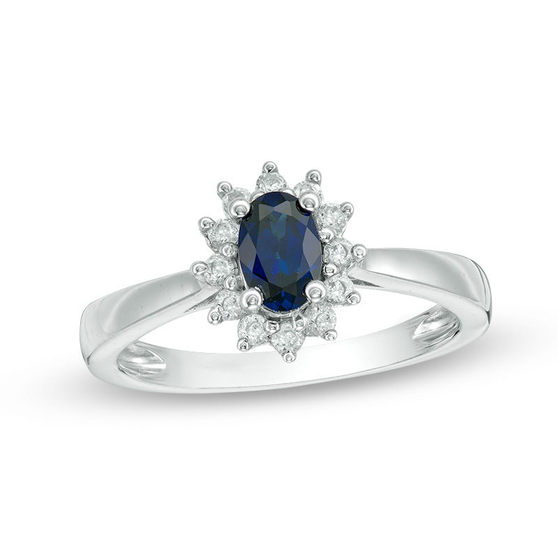 Oval Blue Sapphire and 0.18 CT. T.W. Diamond Starburst Frame Ring in 10K White Gold