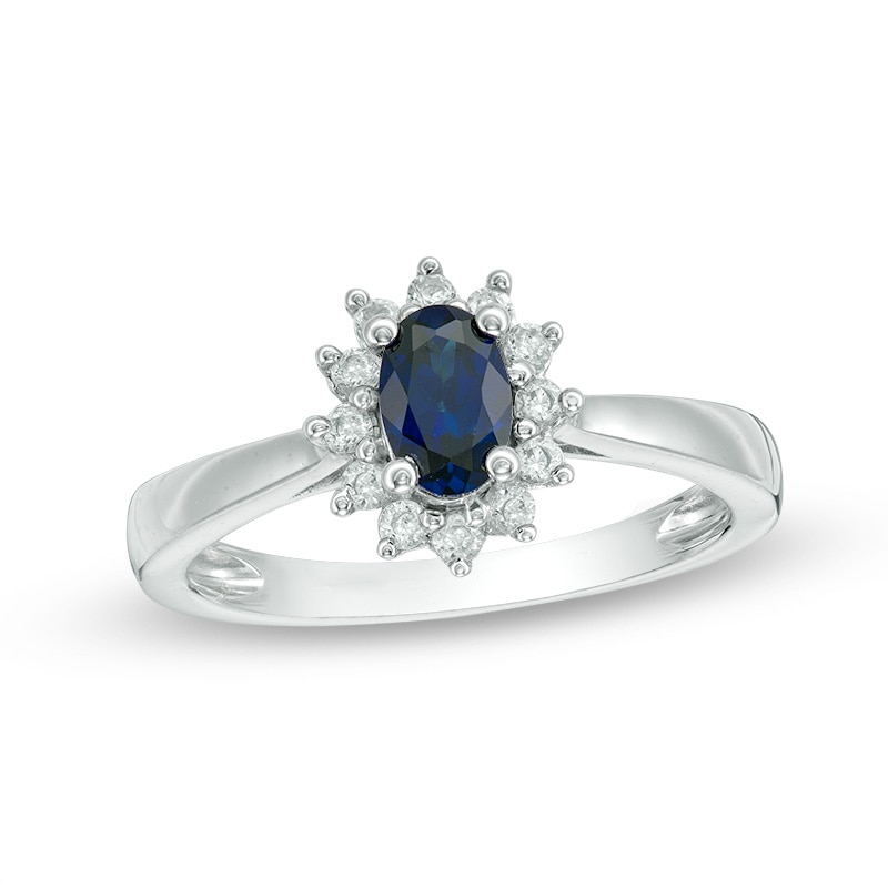 Oval Blue Sapphire and 0.18 CT. T.W. Diamond Starburst Frame Ring 10K White Gold