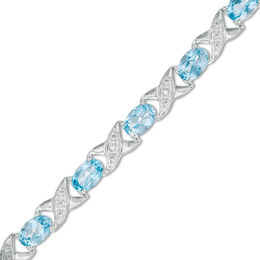 Sideways Oval Swiss Blue Topaz and Diamond Accent &quot;XO&quot; Bracelet in Sterling Silver - 7.25&quot;