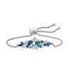 Thumbnail Image 0 of Blue Topaz, Lab-Created Blue Opal, Blue and White Sapphire Floral Bolo Bracelet in Sterling Silver - 9.0"