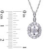 Thumbnail Image 2 of Oval White Topaz and Diamond Accent Frame Pendant in 14K White Gold – 17"