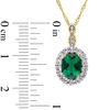 Oval Lab-Created Emerald, White Topaz and Diamond Accent Frame Pendant in 14K Gold – 17"