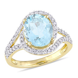 Oval Aquamarine and 0.48 CT. T.W. Diamond Bypass Frame Engagement Ring in 14K Gold