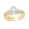 Thumbnail Image 0 of Perfect Fit 0.45 CT. T.W. Diamond Oval Frame Interlocking Bridal Set in 10K Gold