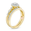 Thumbnail Image 1 of Perfect Fit 0.45 CT. T.W. Diamond Oval Frame Interlocking Bridal Set in 10K Gold