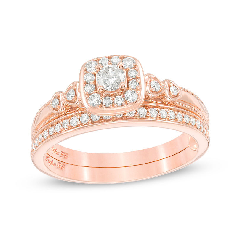 0.37 CT. T.W. Diamond Cushion Frame Interlocking Bridal Set in 10K Rose Gold