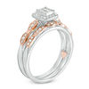 Thumbnail Image 1 of 0.30 CT. T.W. Quad Princess-Cut Diamond Frame Interlocking Bridal Set in 10K Two-Tone Gold