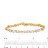 Thumbnail Image 1 of 3.00 CT. T.W. Baguette and Round Diamond Alternating Flower and Infinity Bracelet in 10K Gold - 7.5"