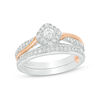 Thumbnail Image 0 of 0.50 CT. T.W. Diamond Tilted Cushion Frame Bypass Interlocking Bridal Set in 10K Two-Tone Gold