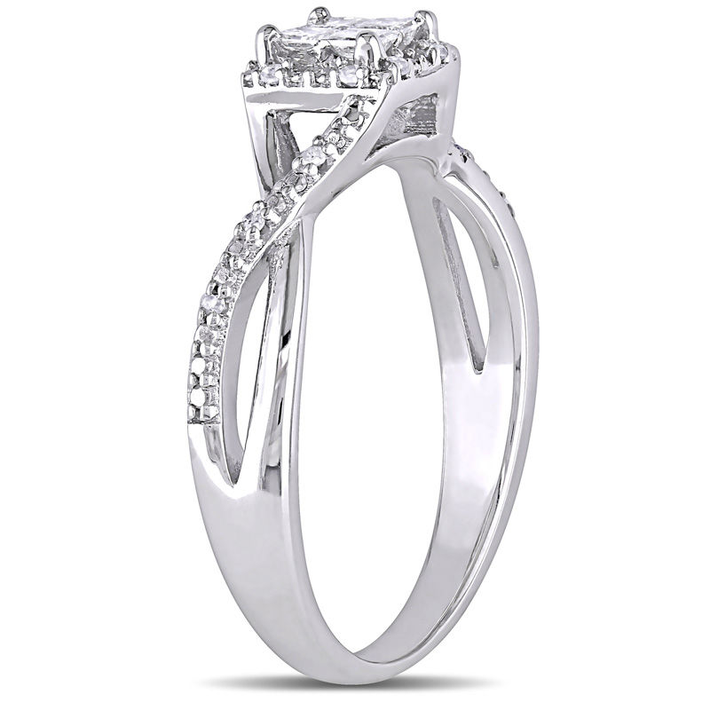 0.27 CT. T.W. Quad Princess-Cut Diamond Frame Twist Shank Promise Ring in Sterling Silver