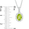 Thumbnail Image 1 of Oval Peridot and Lab-Created White Sapphire Frame Vintage-Style Pendant in Sterling Silver