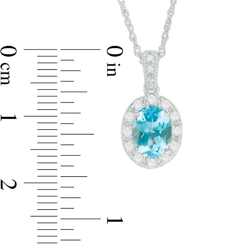 Oval Swiss Blue Topaz and Lab-Created White Sapphire Frame Vintage-Style Pendant in Sterling Silver