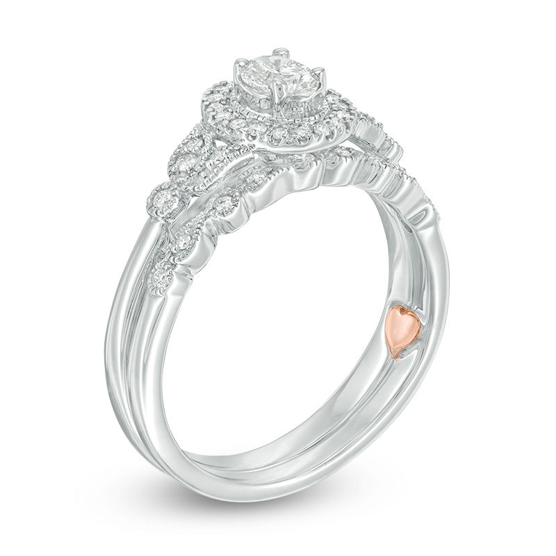 Perfect Fit 0.50 CT. T.W. Oval Diamond Frame Vintage-Style Interlocking Bridal Set in 10K White Gold