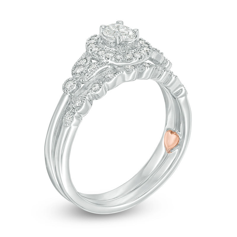 Main Image 2 of Perfect Fit 0.50 CT. T.W. Oval Diamond Frame Vintage-Style Interlocking Bridal Set in 10K White Gold