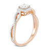 Thumbnail Image 1 of 0.70 CT. T.W. Certified Canadian Cushion-Cut Diamond Frame Twist Engagement Ring in 14K Rose Gold (I/I2)