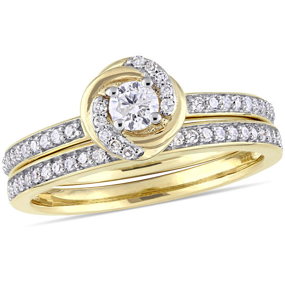 0.47 CT. T.W. Diamond Swirl Bridal Set in 10K Gold