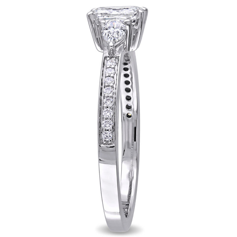 0.61 CT. T.W. Emerald-Cut and Pear-Shaped Diamond Three Stone Engagement Ring in 14K White Gold