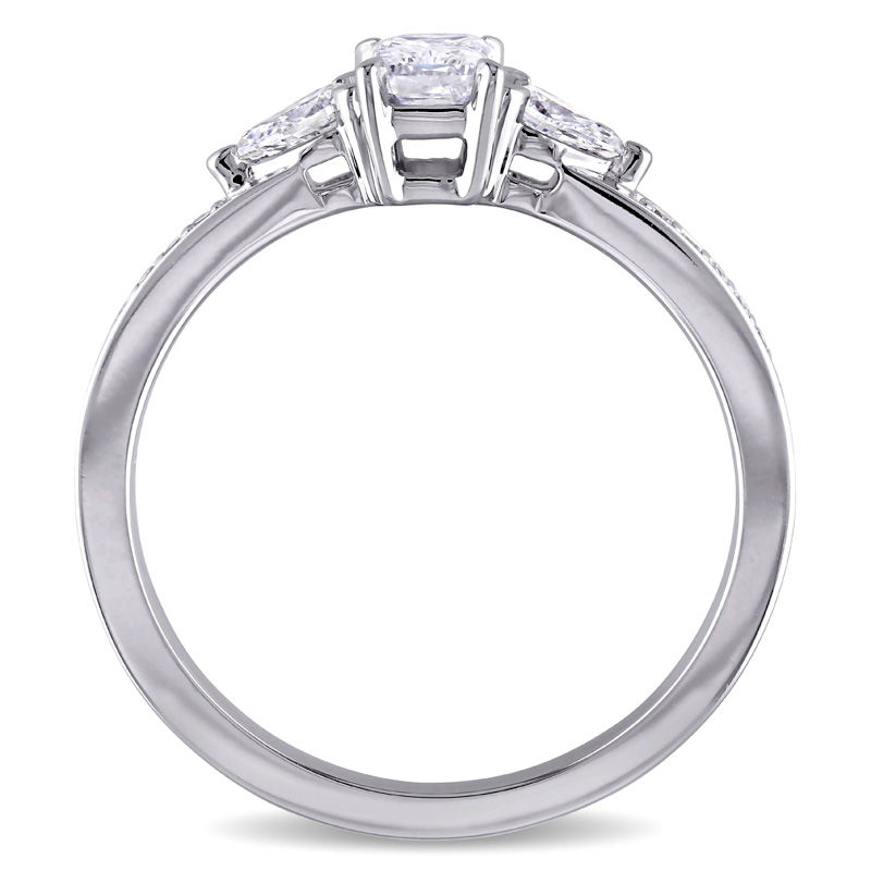 0.61 CT. T.W. Emerald-Cut and Pear-Shaped Diamond Three Stone Engagement Ring in 14K White Gold