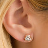 Thumbnail Image 1 of 0.146 CT. T.W. Diamond Love Knot Stud Earrings in 10K Rose Gold