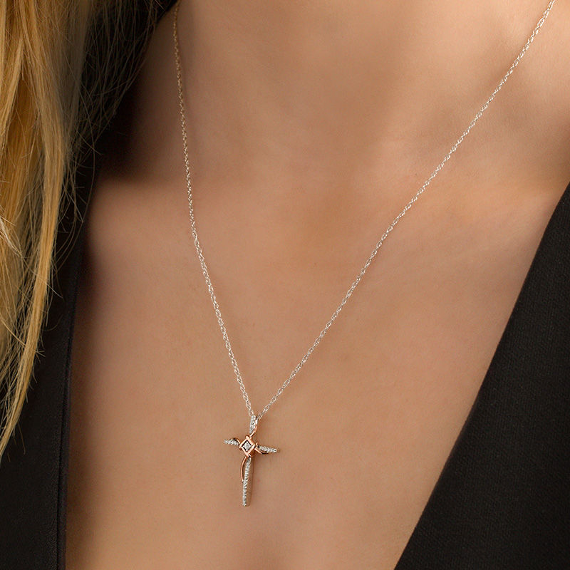 0.086 CT. T.W. Diamond Layered Knot Cross Pendant in Sterling Silver and 10K Rose Gold