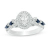 Thumbnail Image 0 of Vera Wang Love Collection 0.95 CT. T.W. Oval Diamond and Blue Sapphire Frame Engagement Ring in 14K White Gold