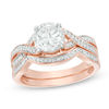Thumbnail Image 0 of 7.0mm Lab-Created White Sapphire and 0.145 CT. T.W. Diamond Twist Bridal Set in 10K Rose Gold
