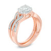 Thumbnail Image 1 of 7.0mm Lab-Created White Sapphire and 0.145 CT. T.W. Diamond Twist Bridal Set in 10K Rose Gold