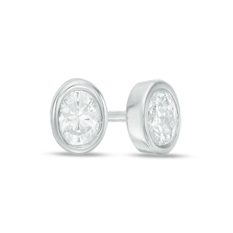 0.15 CT. T.W. Oval Diamond Solitaire Stud Earrings in 10K White Gold|Peoples Jewellers