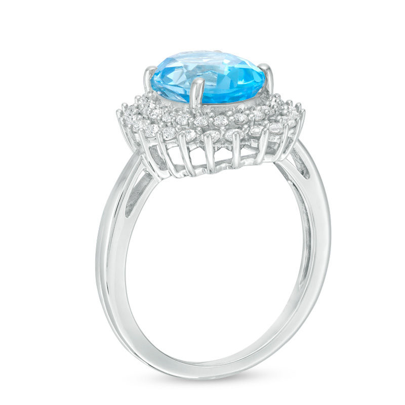 Oval Swiss Blue Topaz and Lab-Created White Sapphire Sunburst Frame Ring in Sterling Silver