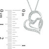 0.04 CT. T.W. Diamond Double Heart Pendant in Sterling Silver