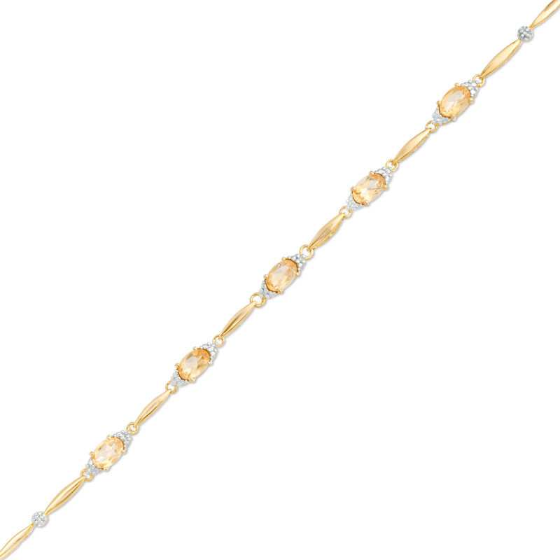 Main Image 1 of Oval Citrine and Diamond Accent Bracelet in Sterling Silver with 10K Gold Plate - 7.25"
