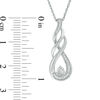 0.085 CT. T.W. Diamond Flame Pendant in Sterling Silver