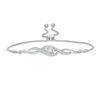 Thumbnail Image 1 of 0.066 CT. T.W. Diamond Three Stone Twist Bolo Bracelet in Sterling Silver - 9.5"